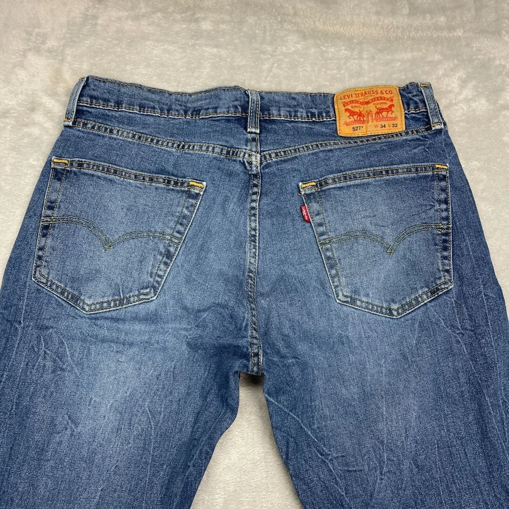 Levi's Jeans Mens 34x32 Blue Denim 527 Stretch Faded Mid Rise Slim Bootcut Leg